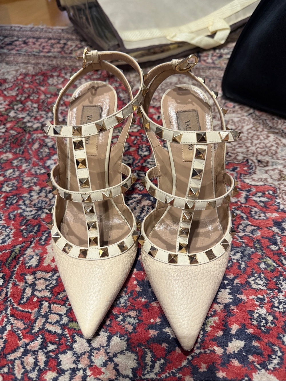 Valentino Garavani Rockstud Pointed Toe T-Strap Pumps in Beige and Gold